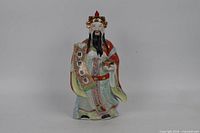 Front view of Caishen porcelain figurine