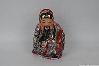 Front view of hand-painted porcelain Shouxing figurine