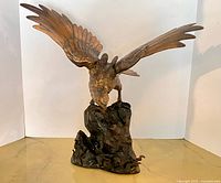 front view of eagle sculpture showing wingspan and base