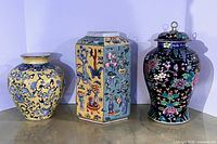 Three jars side by side showing sizes and decoration