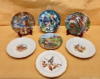 Seven of the ten plates arranged together for scale and pattern overview