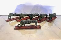 Six elephant drawer pulls grouped