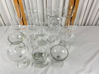 Group shot of all clear glass pieces on table