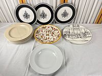 Group shot of all eleven plates laid out on table