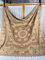 Full view of throw blanket hanging to show pattern and size