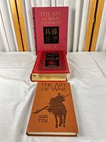 Front covers of the three Sun Tzu books