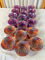 Full set of tealight holders showing both colourways in rows