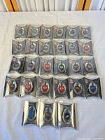 All 28 sealed Lucky Stones laid out in rows on table