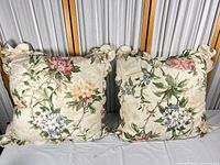 Front view of both matching floral pillows