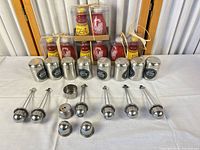 Full lot showing tins, infusers and boxed shakers
