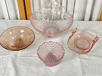 Group shot of all five pink glass pieces