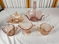 Group shot of all five pink glass pieces