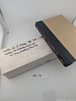 Boxed card set with book on top