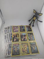 Cards and stickers in sleeves with bendable Gremlin figure