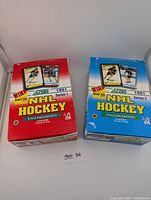 Front view of both Score 1991 NHL Hockey Series 1 (red) and Series 2 (blue) boxes