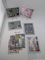 Front view of all eight Derek Jeter cards on and below stands