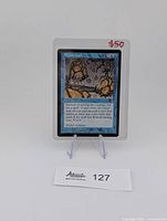 Front view of Dream Halls card inside plastic case