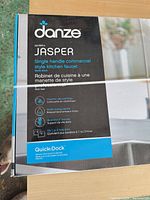 Front of boxed Danze Jasper faucet showing model and features