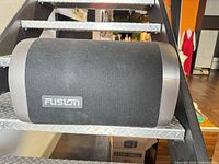 Side view showing Fusion logo on cabinet