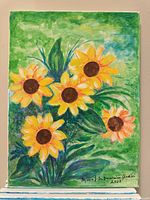 Front view of signed acrylic sunflower painting on canvas