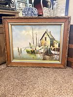 Front view of framed seascape oil painting signed Bernan