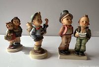 All three Goebel Hummel figurines front view