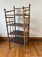 Front three-quarter view showing full height, bamboo frame and four shelves