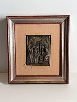 Front view of framed silver icon showing full artwork and frame