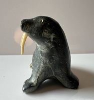 Front view of soapstone walrus showing overall form and tusks