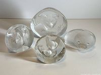 Group shot of all four crystal animal relief sculptures