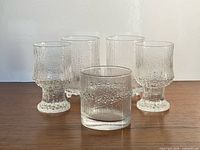 Group shot of five textured Iittala glasses