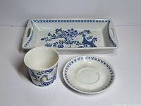 Tray, sugar bowl and saucer grouped