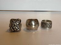 All three sterling silver rings side by side