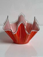 Front view showing folded rim, red with white pinstripes