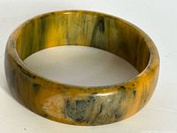 Overall view of Bakelite bangle showing marbled pattern