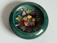 Top view showing full Columbine floral interior and green glaze