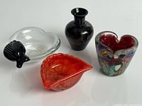 Group shot of four Murano glass pieces