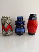 Front view of three West German vases