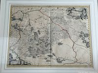 Full view of framed map showing entire composition, matting and frame