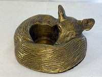 Overhead view of fox tealight holder showing cavity and fur texture