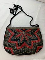 Full view of purse showing bead design and strap