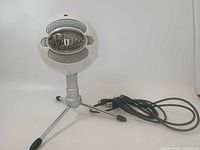 Front view of Blue Snowball iCE on stand with USB cable