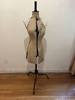 Full view of dress form on tripod base