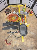 Full view of lot showing all tools, cords, welding shield and accessories