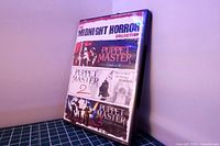 Front view of DVD case displaying Midnight Horror Collection Puppet Master 1-3 artwork