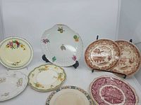 Front view of all eight decorative plates