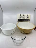 All three mixing bowls and Cuistometre converter grouped together