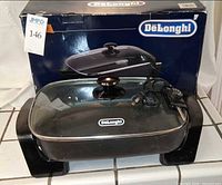 Box and one skillet displayed