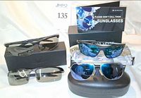 All four sunglasses with cases displayed