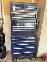 Full view of blue Craftsman rolling tool chest